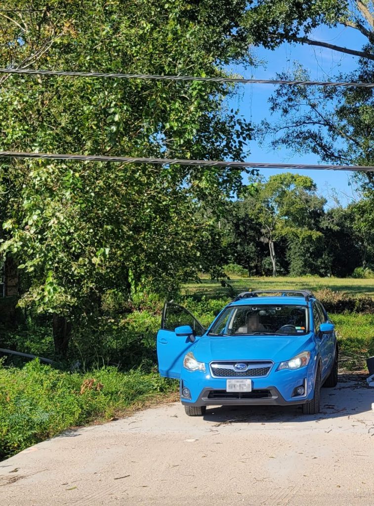 Showing low-hanging wires too low over the driveway